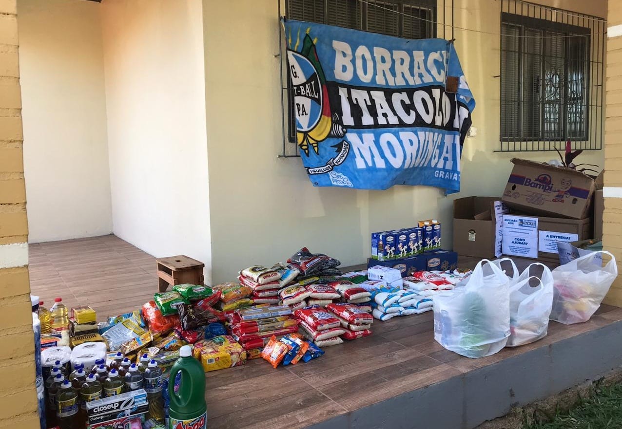 Avalanche de solidariedade; torcida gremista distribui cestas básicas em Gravataí